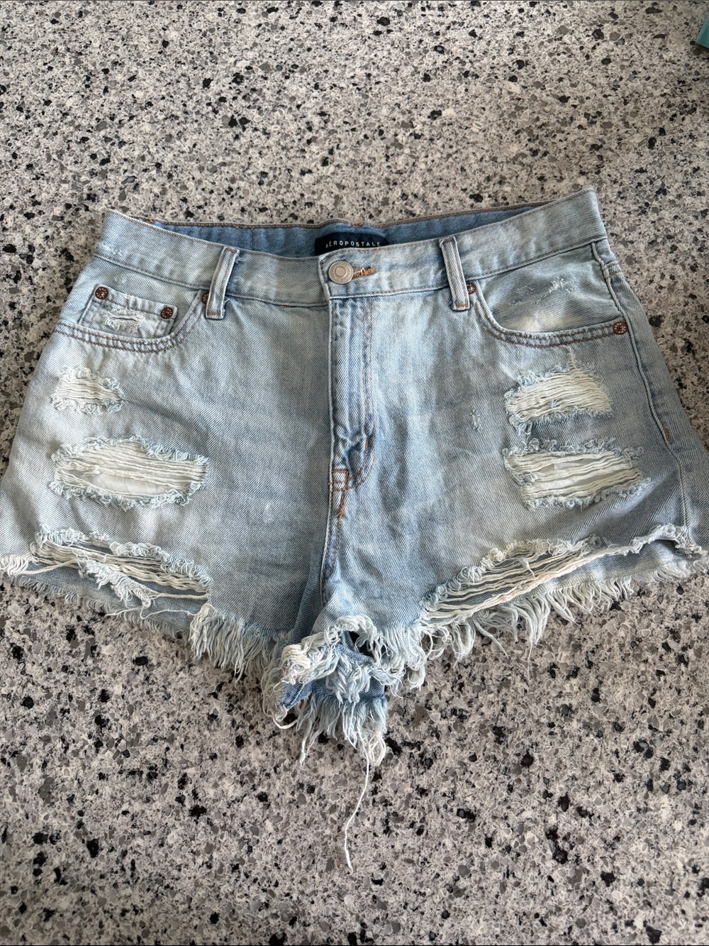 Women’s Light Wash Distressed Denim Shorts